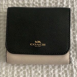 Coach polished pebble leather snap bifold wallet